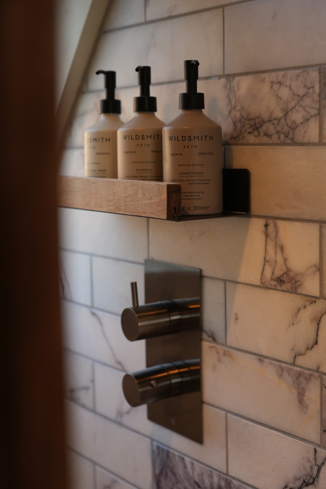 Wildsmith bath products and marble shower detail